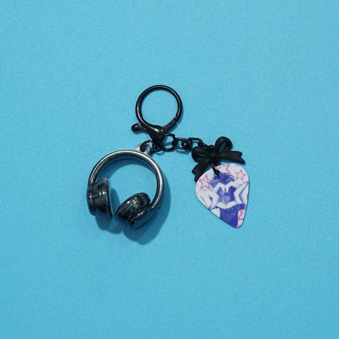Fanmade CORTIS guitar pick keychain for a concert bag or bias charm setup
